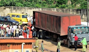 Photo: Lagos area boys celebrate Democracy Day with beer from ill-fated lorry 