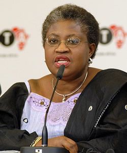 Okonjo-Iweala corporate portrait, speaksinto mic