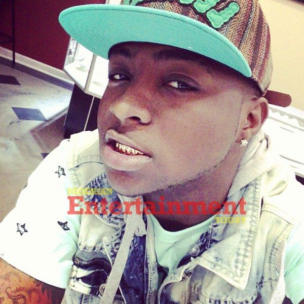 Davido-shows-off-his-Gold-grills-600x600